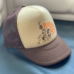 Ride or Die Gal on a Buffalo trucker snapback hat designed by Intrigue Ink